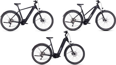 On display are three black Cube Nuride Hybrid e-bikes, each with a diamond frame, a trapezoidal frame, and a low step-through frame.