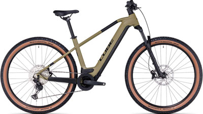 A brown Cube Reaction Hybrid bicycle is shown.