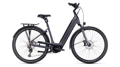 The image shows a gray Cube Supreme Hybrid EXC e-bike with a low step-through frame.