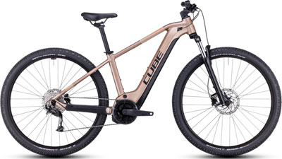 On display is a rose gold Cube Reaction Hybrid bicycle.