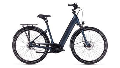 The image shows a dark blue Cube Supreme Hybrid EXC e-bike with a low step-through frame.