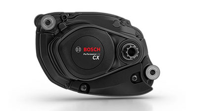 A black Bosch Performance Line CX e-bike motor can be seen.