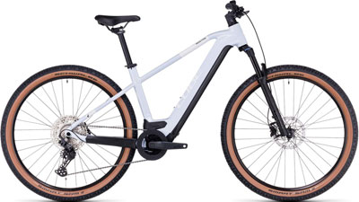 A white Cube Reaction Hybrid bike is shown.