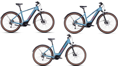 On display are three blue Cube Nuride Hybrid e-bikes, each with a diamond frame, a trapezoidal frame, and a low step-through frame.